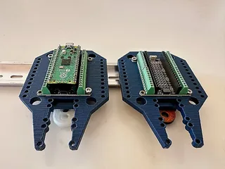 Din Rail mount for Adafruit PiCowbell Screw terminal board.