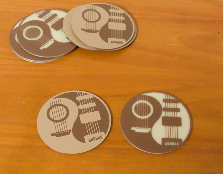 Coaster with guitar artwork