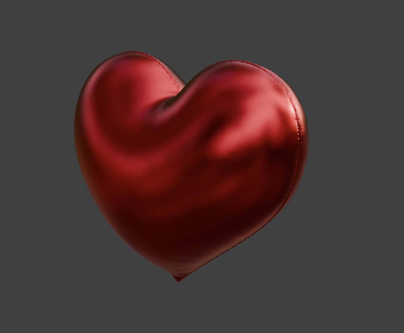 Inflated heart shaped balloon