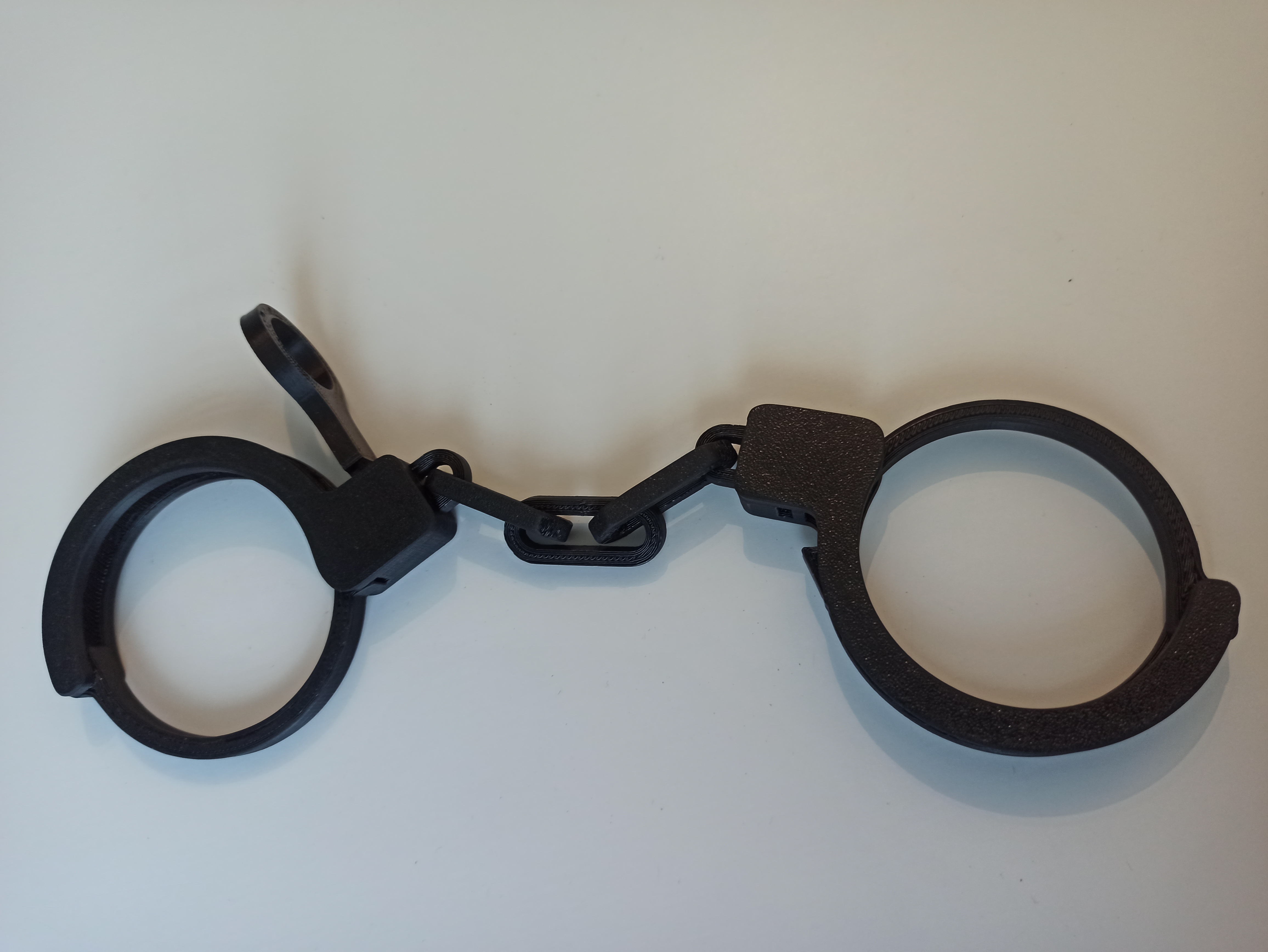 Print-in-place handcuffs