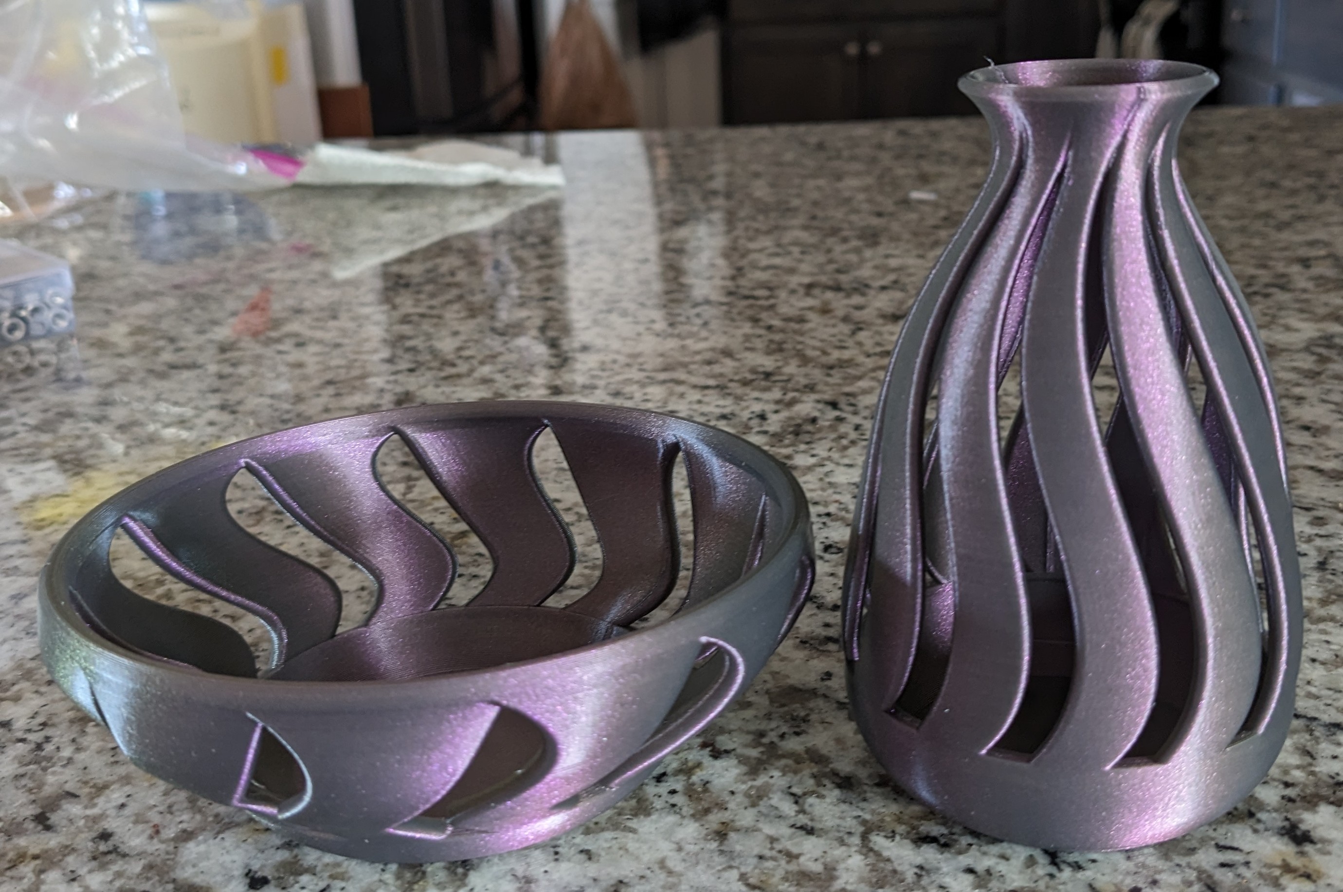 Visually interesting modern vase design with matching candy bowl.