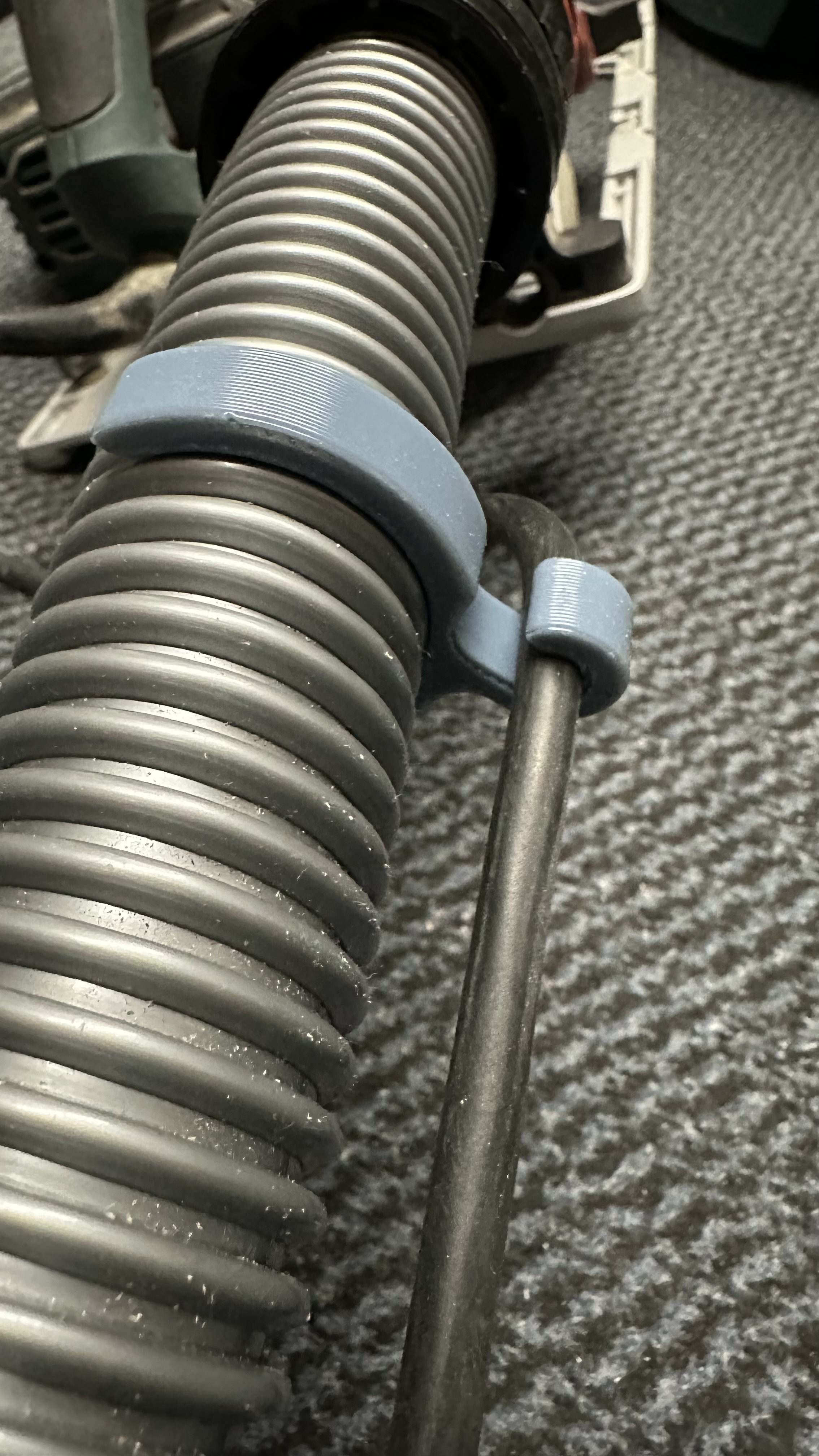 cable guide for suction hose