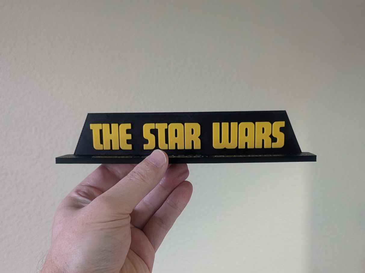 1975 Star Wars Logo + Stand