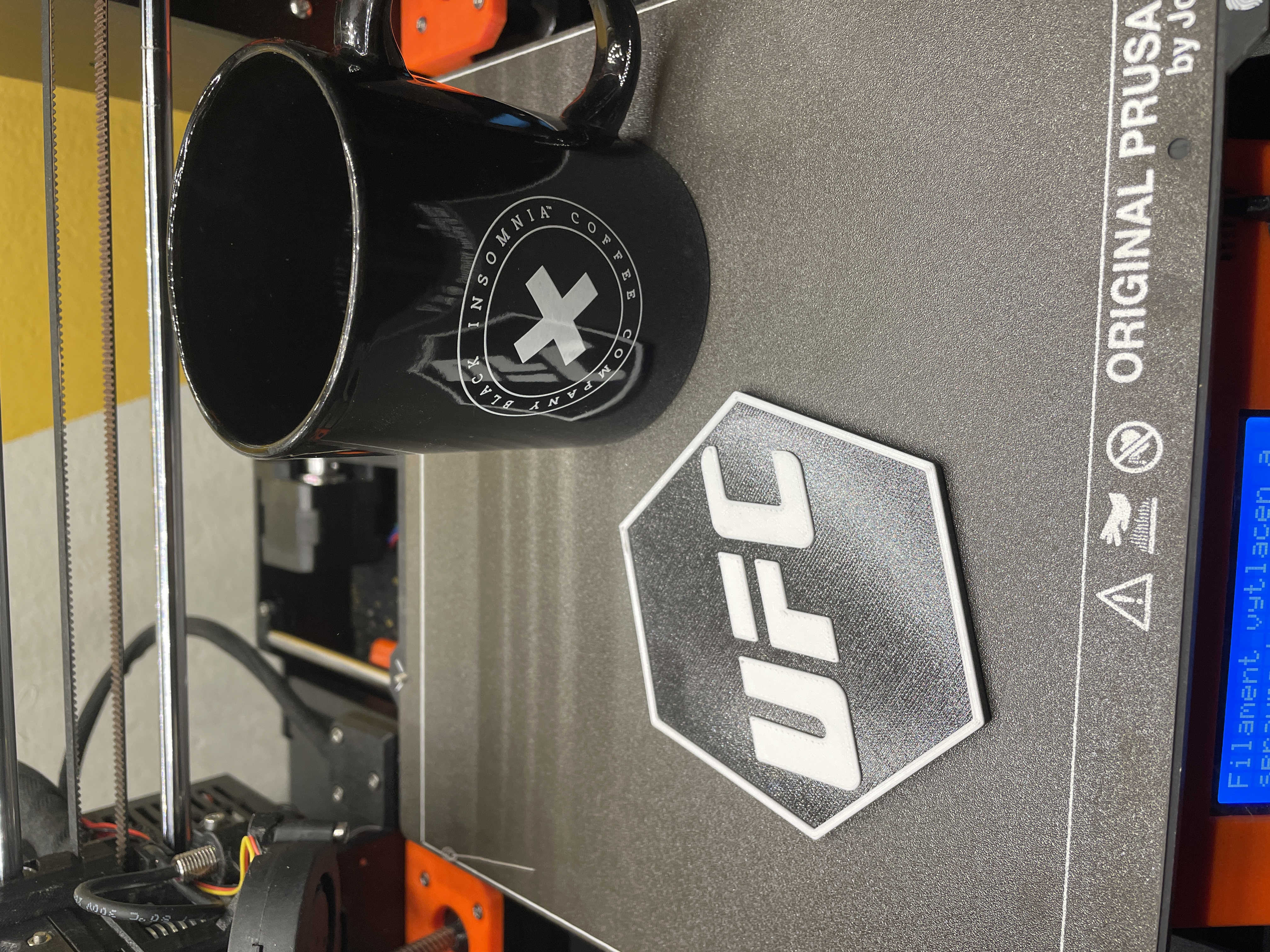 Coaster with UFC logo - not necessary multimaterial.