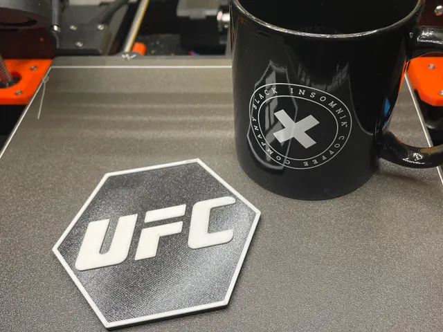 Coaster with UFC logo - not necessary multimaterial.