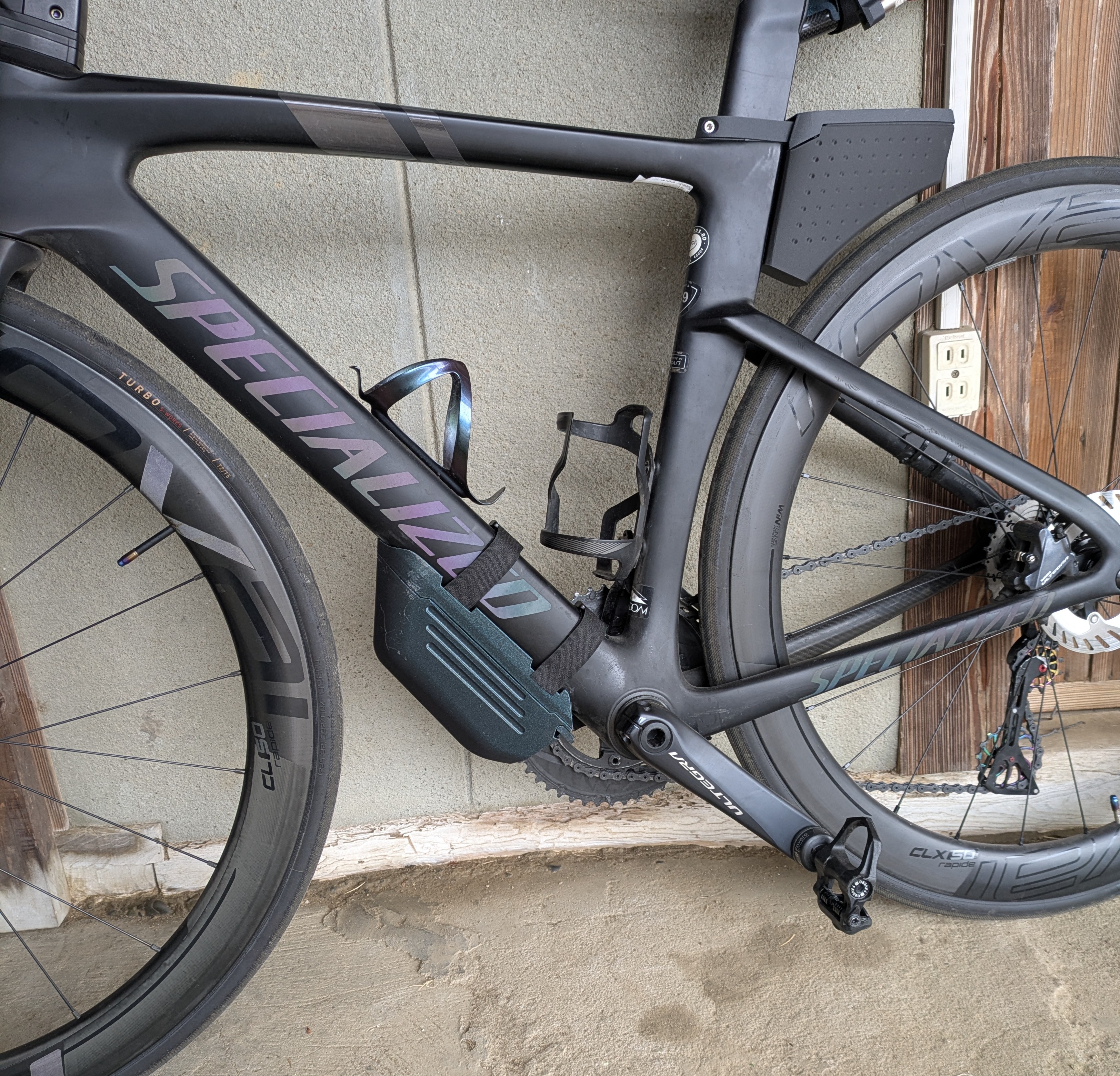 Bike down tube storage box swing open