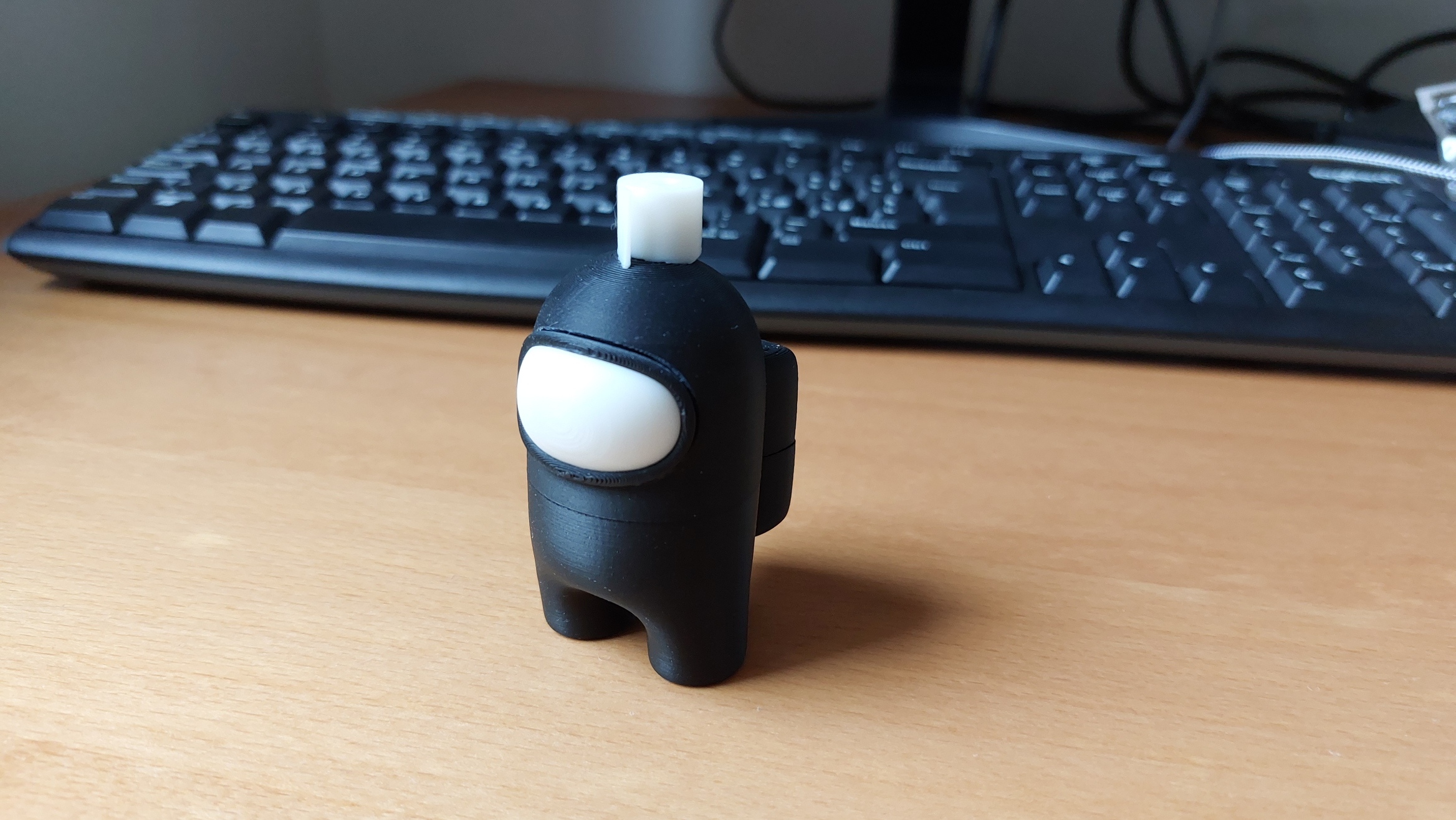 Among us figure with toilet paper hat