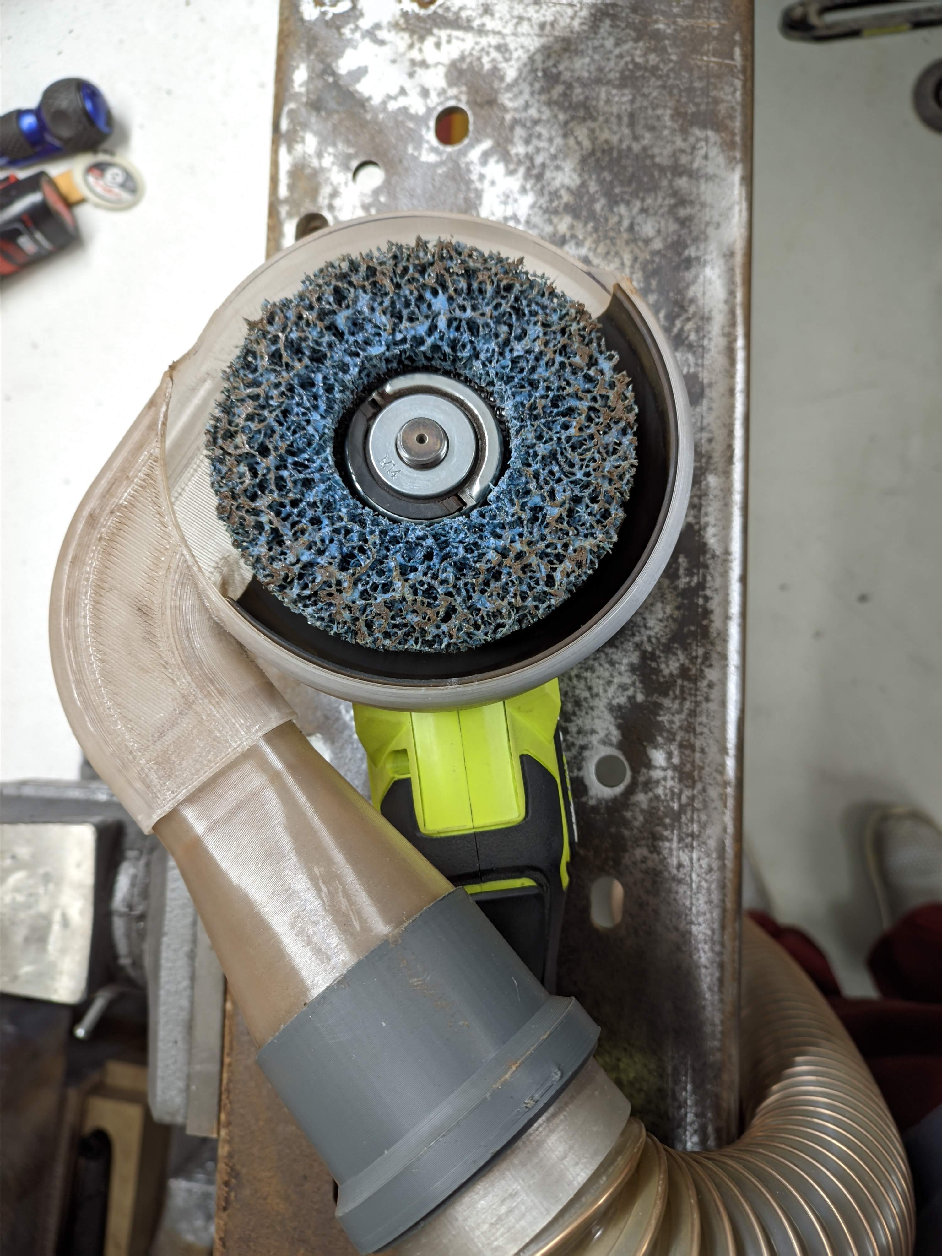 Experimental angle grinder dust cover