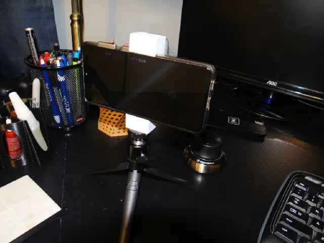 Universal phone tripod adapter