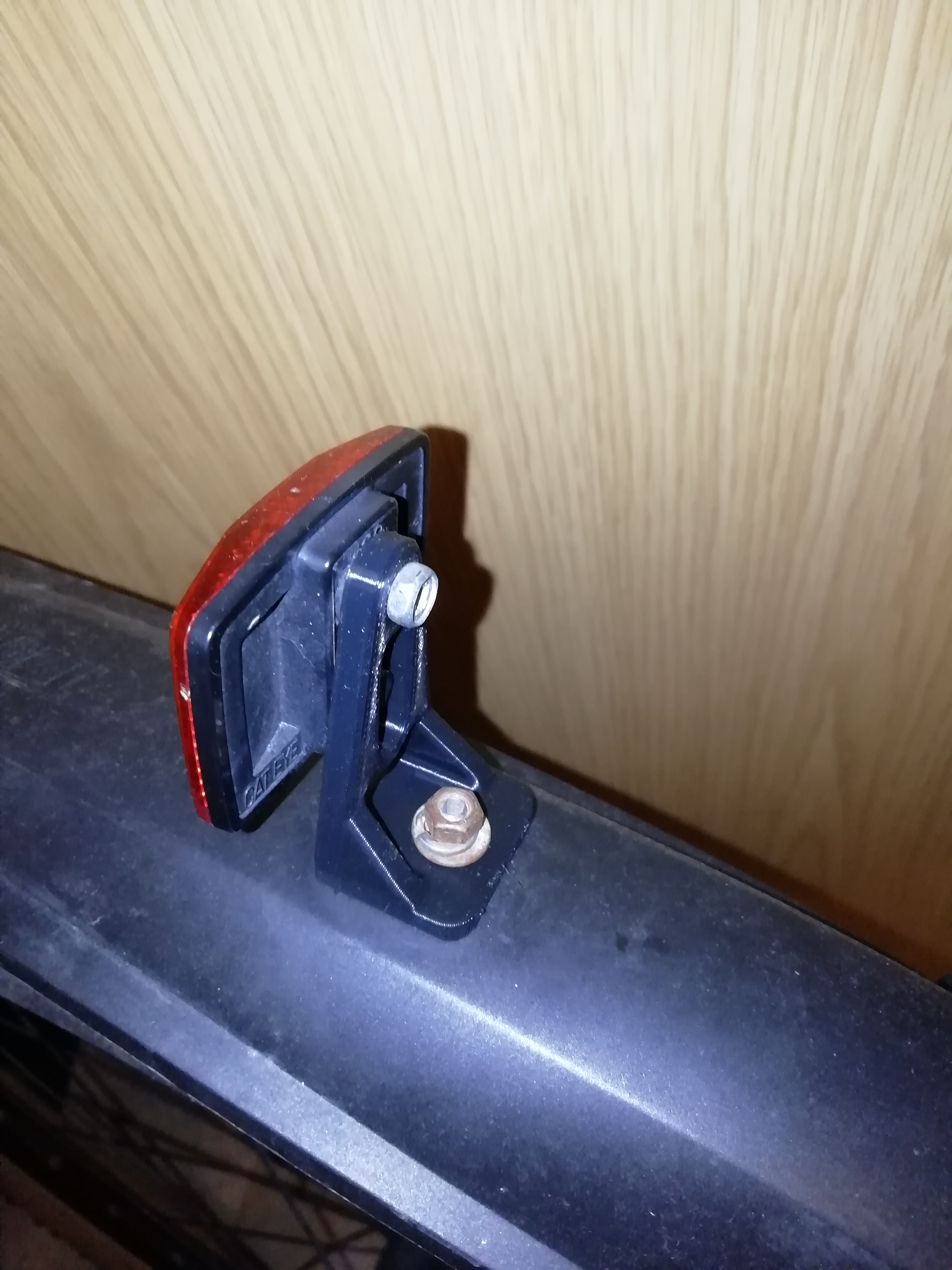 Front and rear reflector holder for Mountain Bike