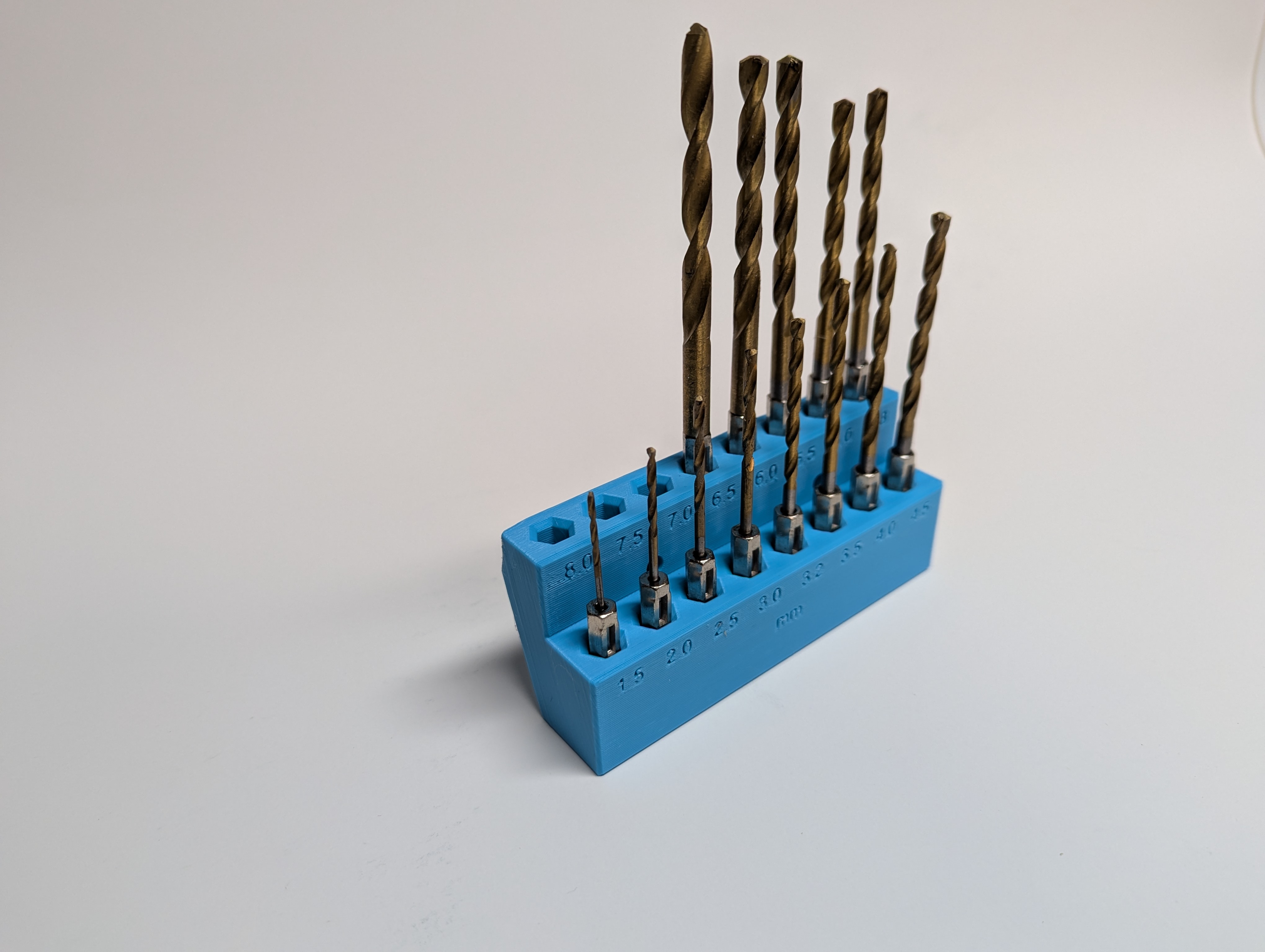 Metric hex drill bit index for pegboard