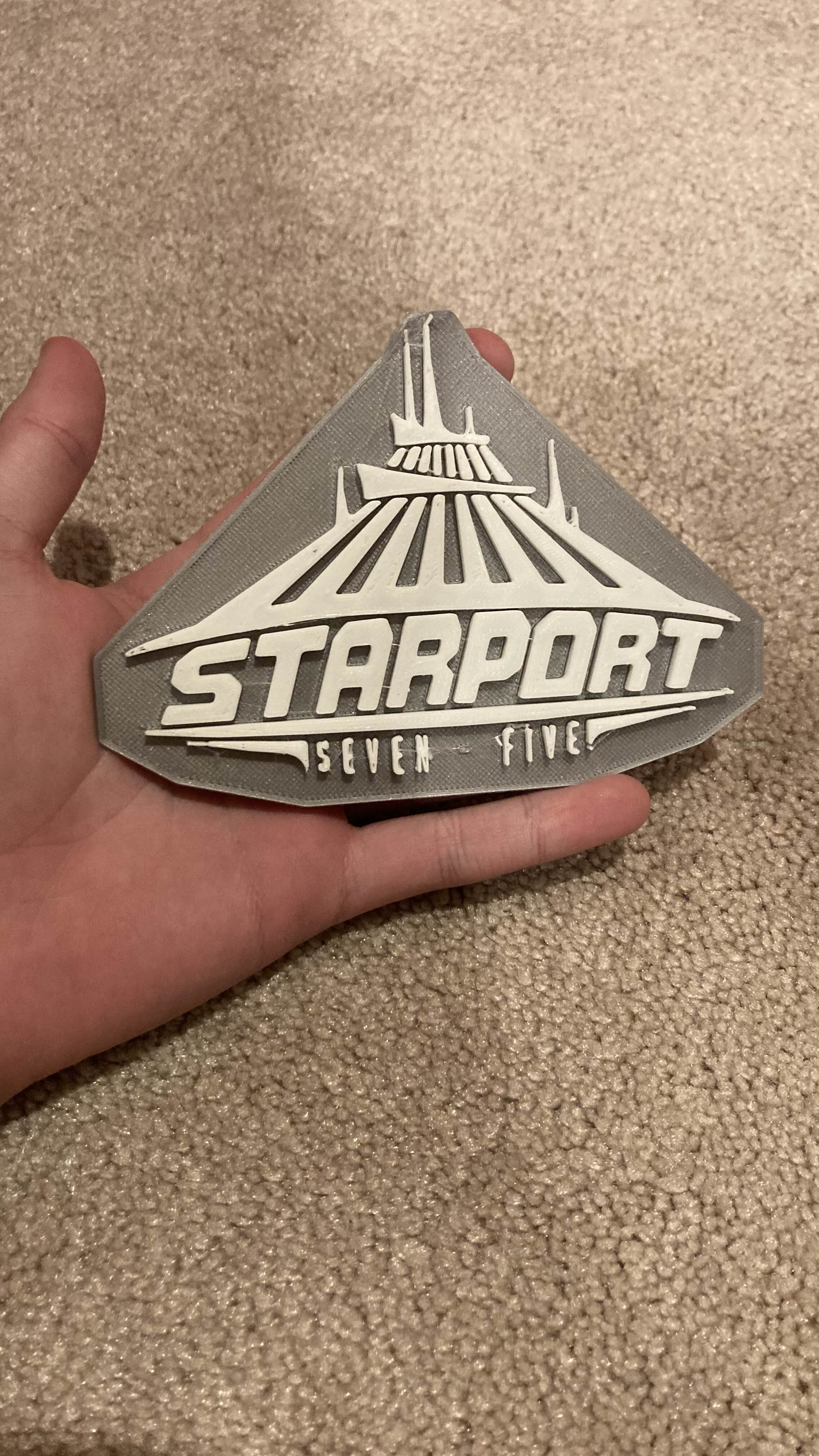 STARPORT Seven-Five Sign