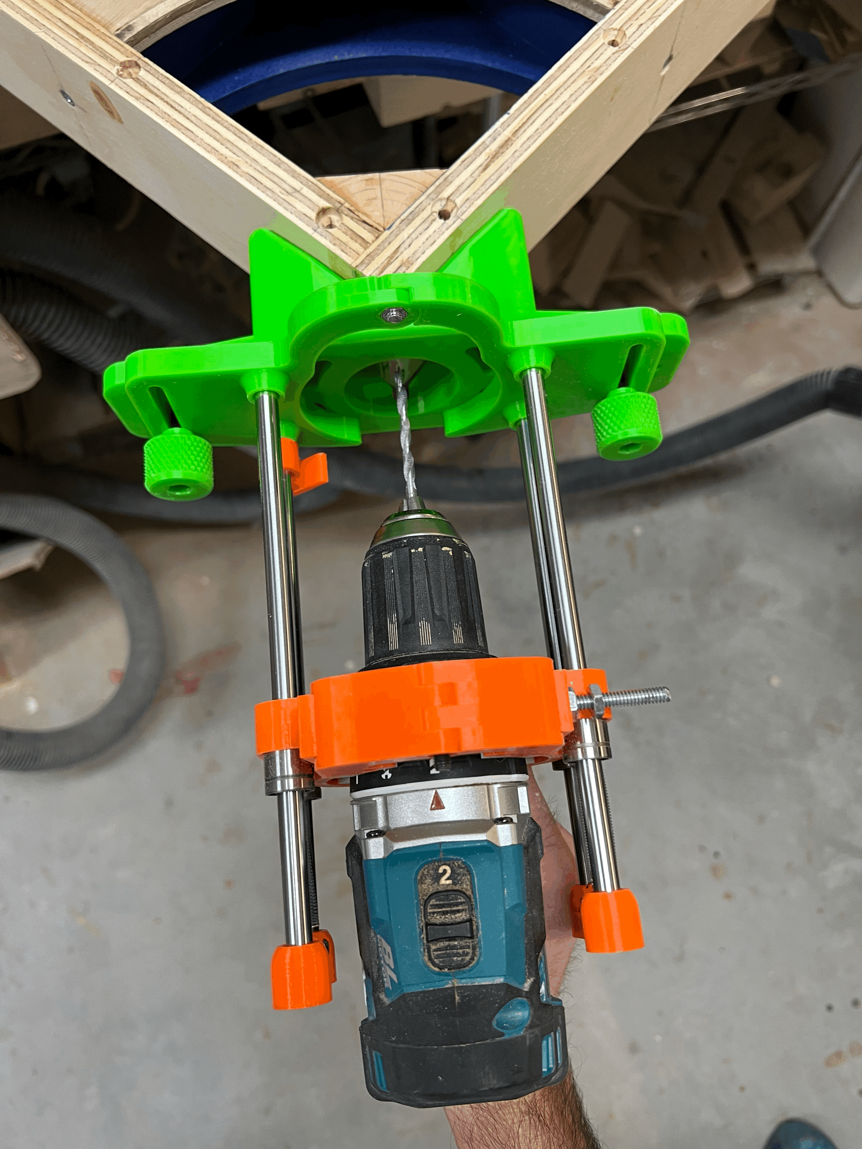 Portable drill press with large base and optional right angle corner jig.