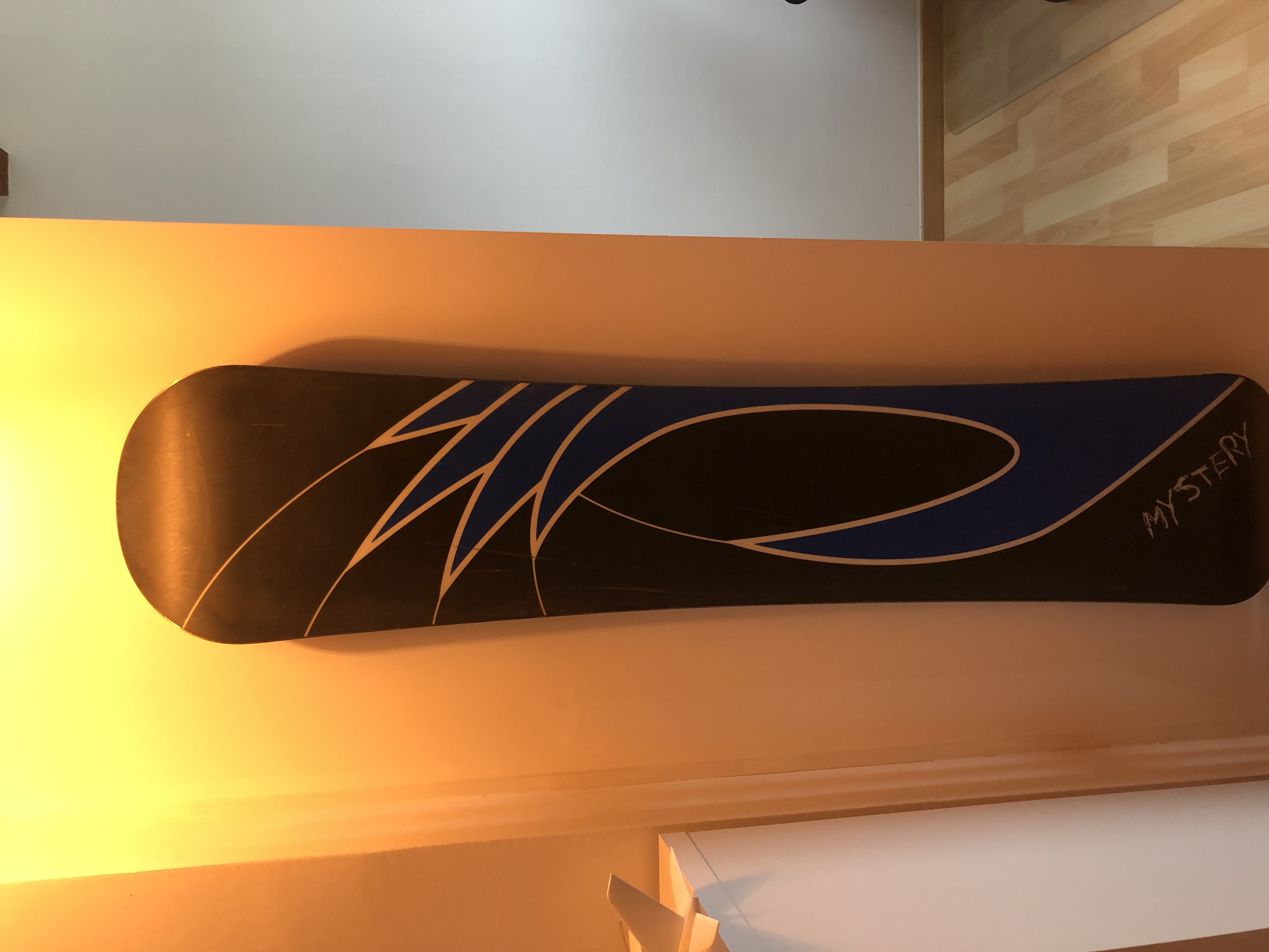 Snowboard wall mount