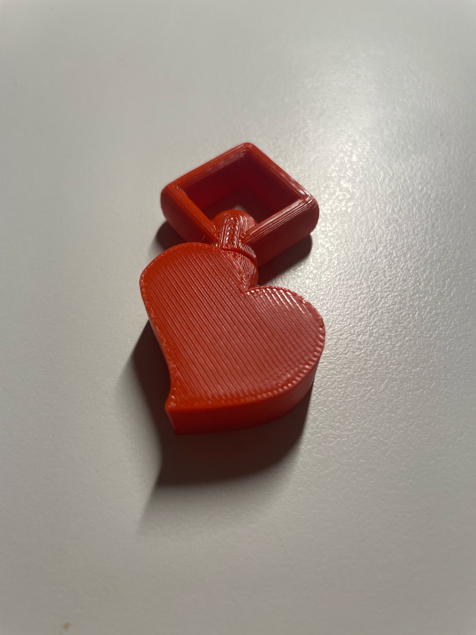 Key fob with rotating heart