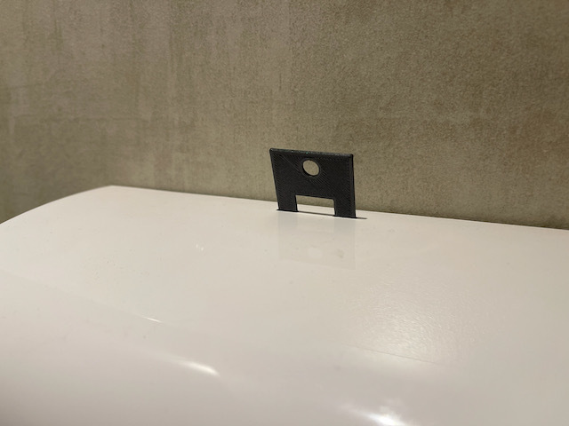 Cliver paper towel dispenser key