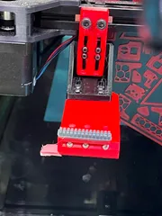 Gantry mounted nozzle scrubber with auto poop-eject