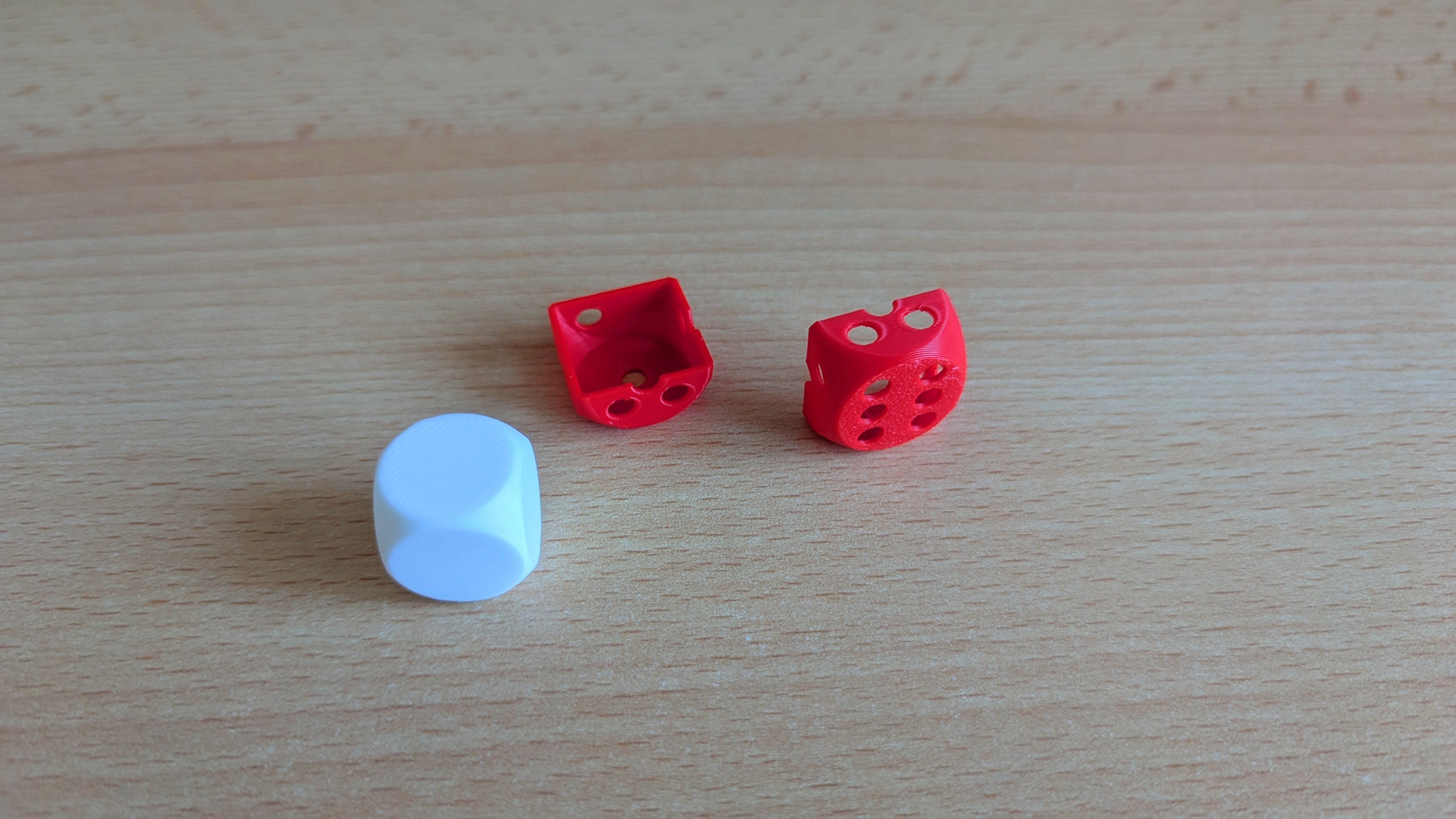 Multi-colored playing dice