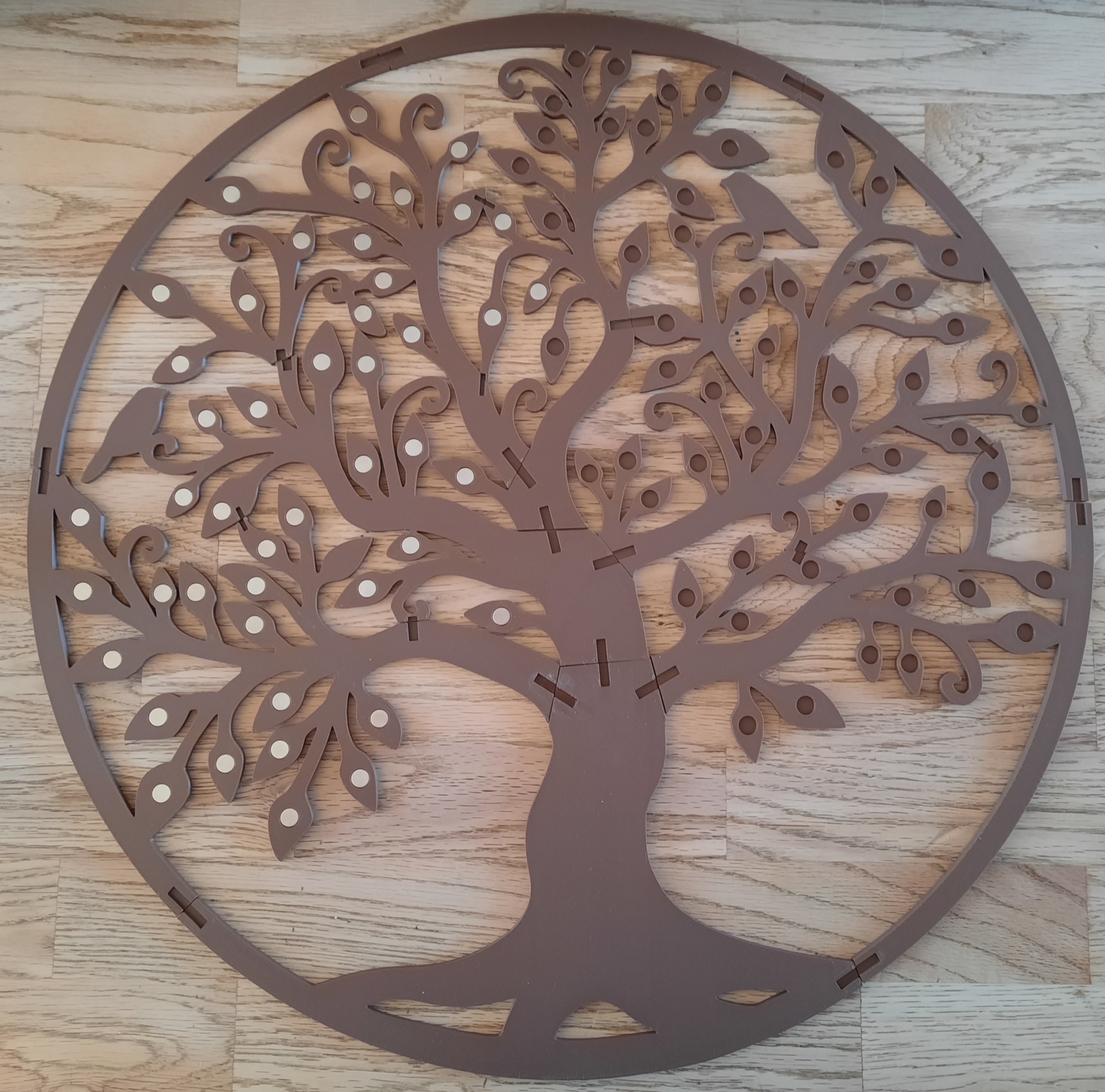 Tree decoration with holes for magnets