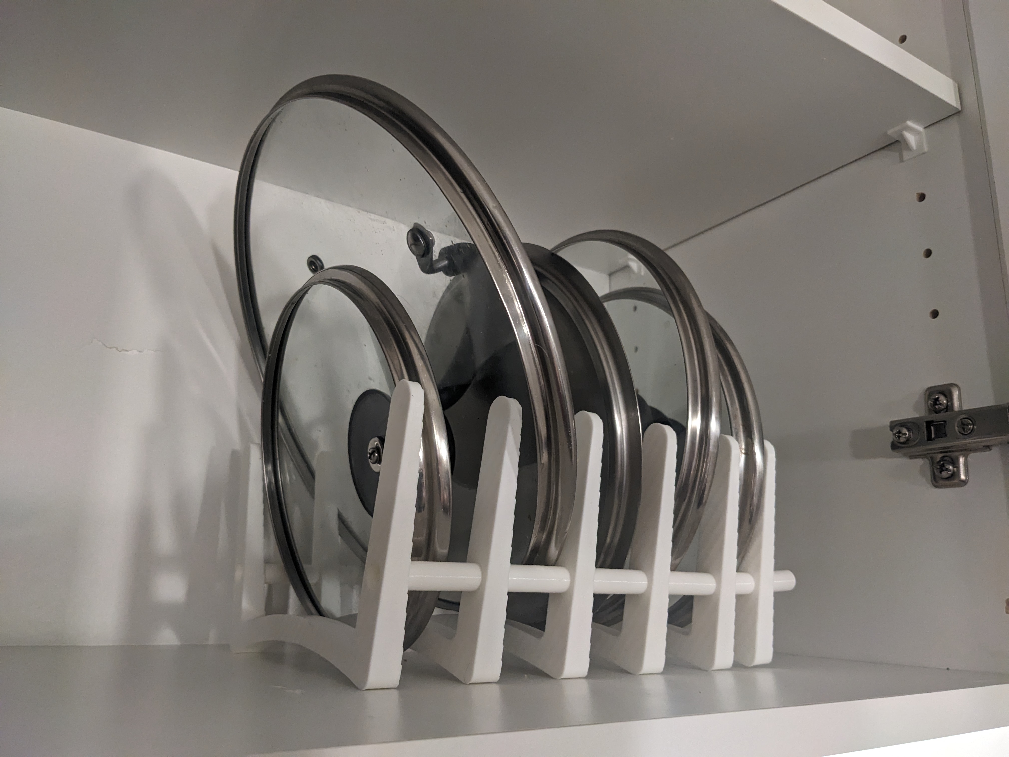 Miniatura 2 do modelo 3D Chaining Pot Lid Rack