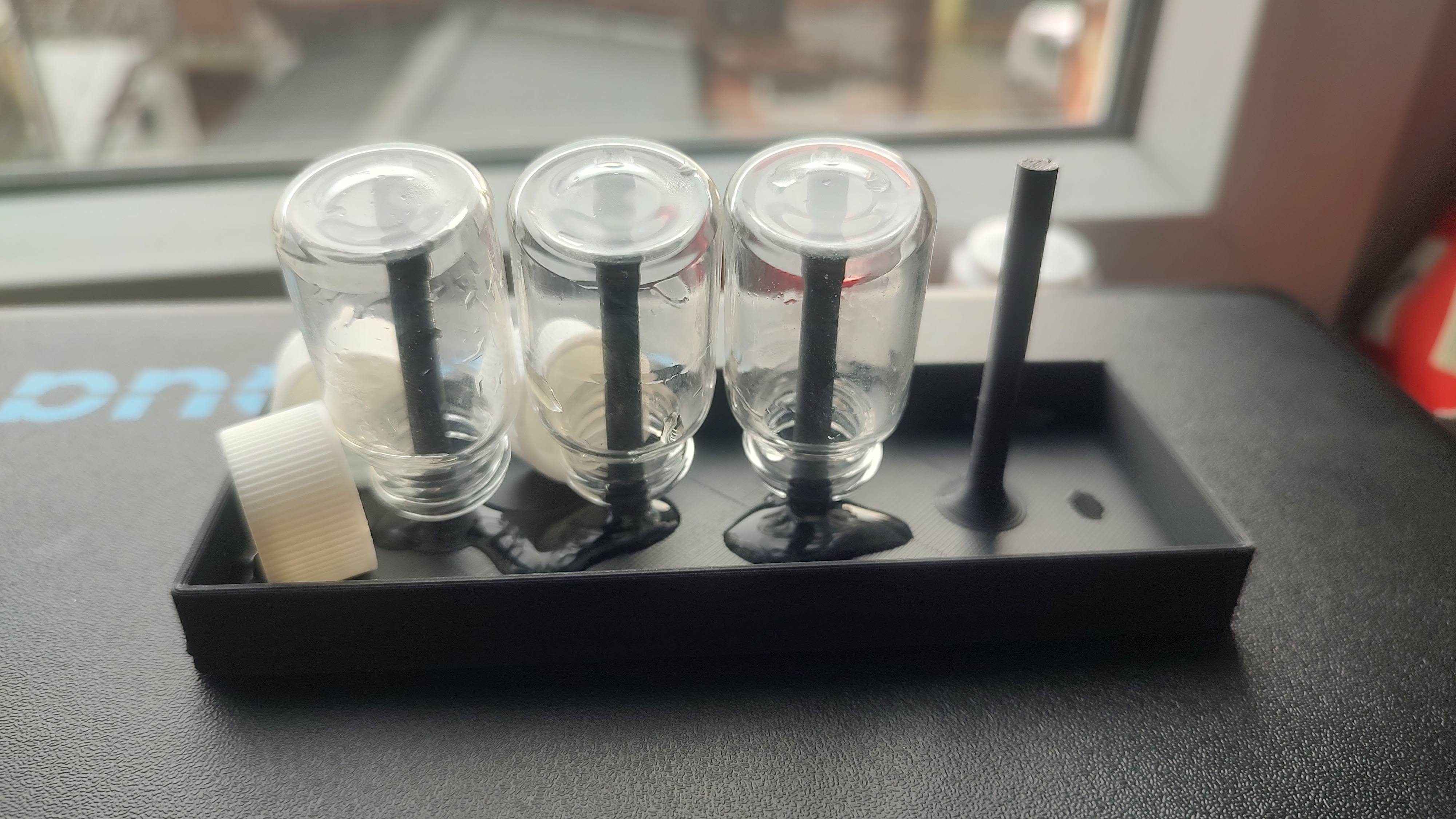 Vial drainer for photometer
