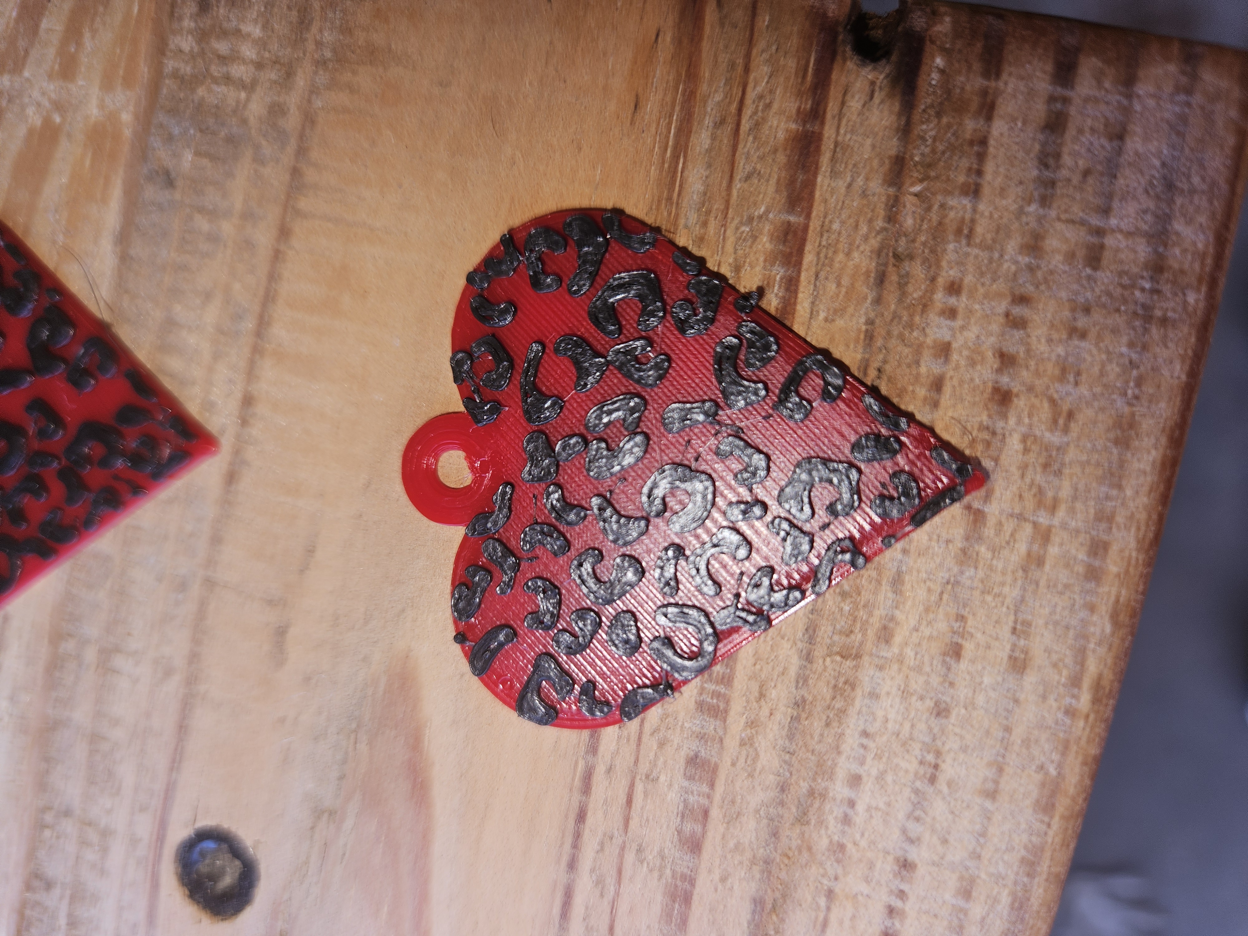 Leopard print heart earring