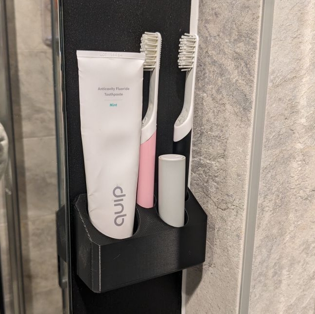 Dual quip toothbrush station
