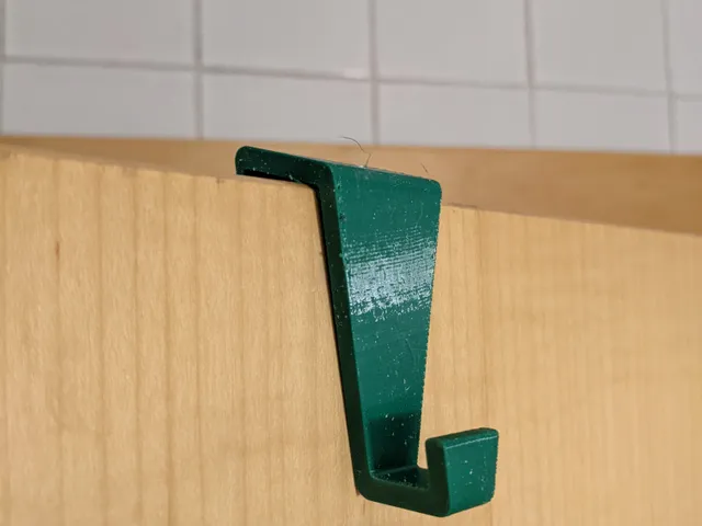 Door hook to fit wooden doors and hang light loads