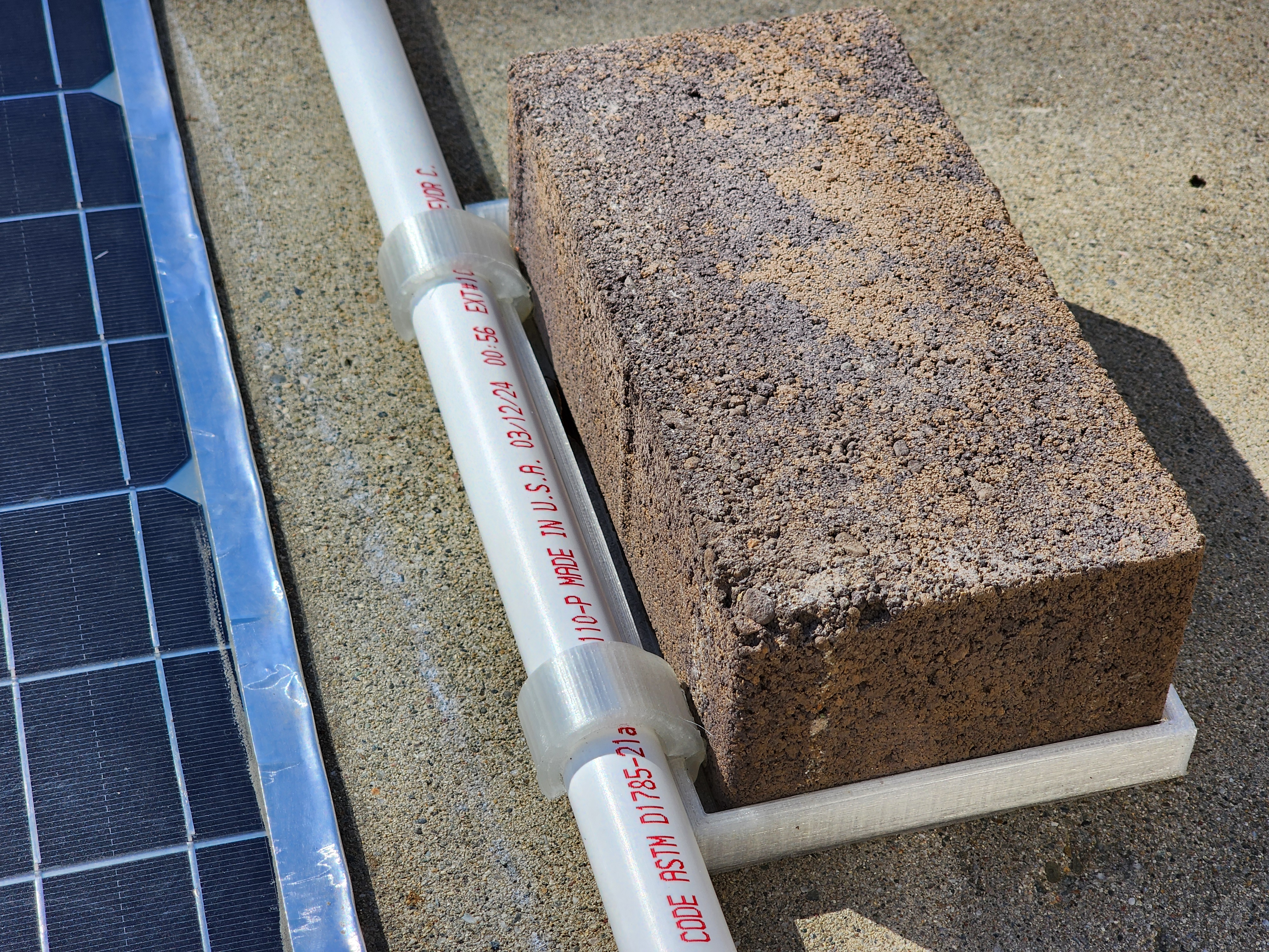 Solar Panel Frame Grounding System w/ Bricks