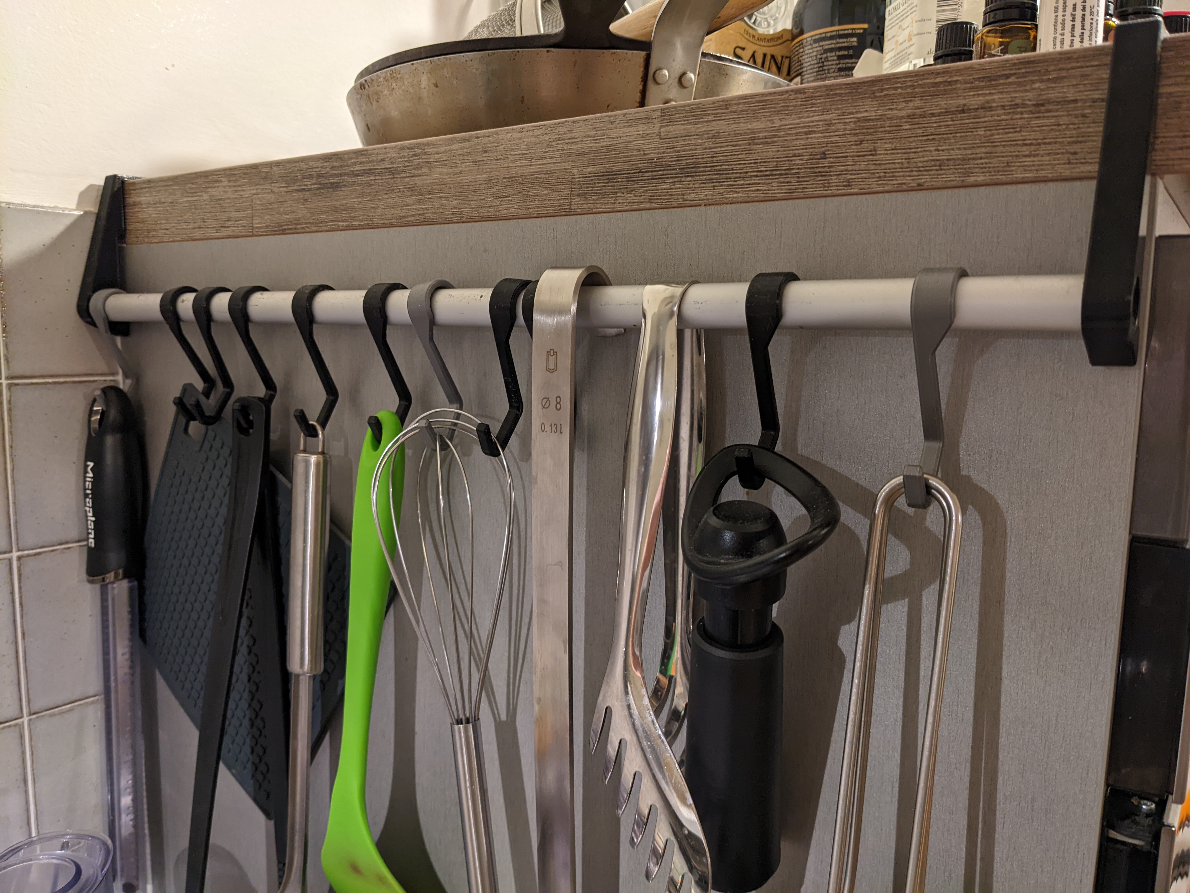 Kitchen tools organizer with hooks