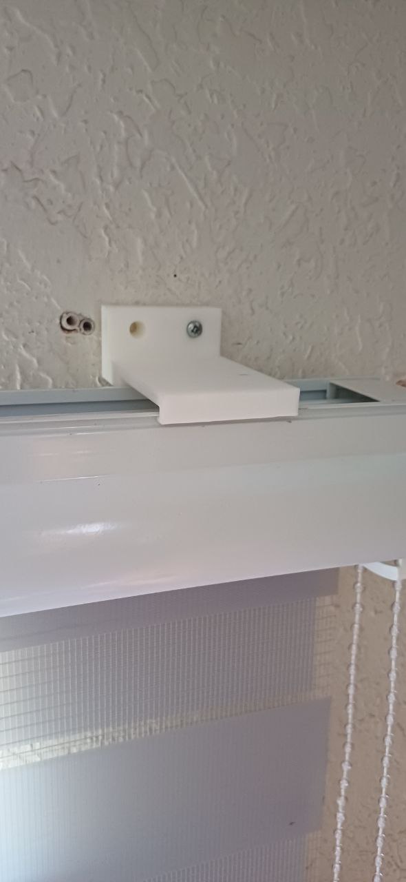 Clip Cortina Roller Pared