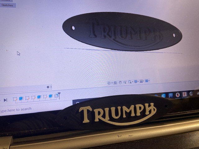 Triumph nameplate