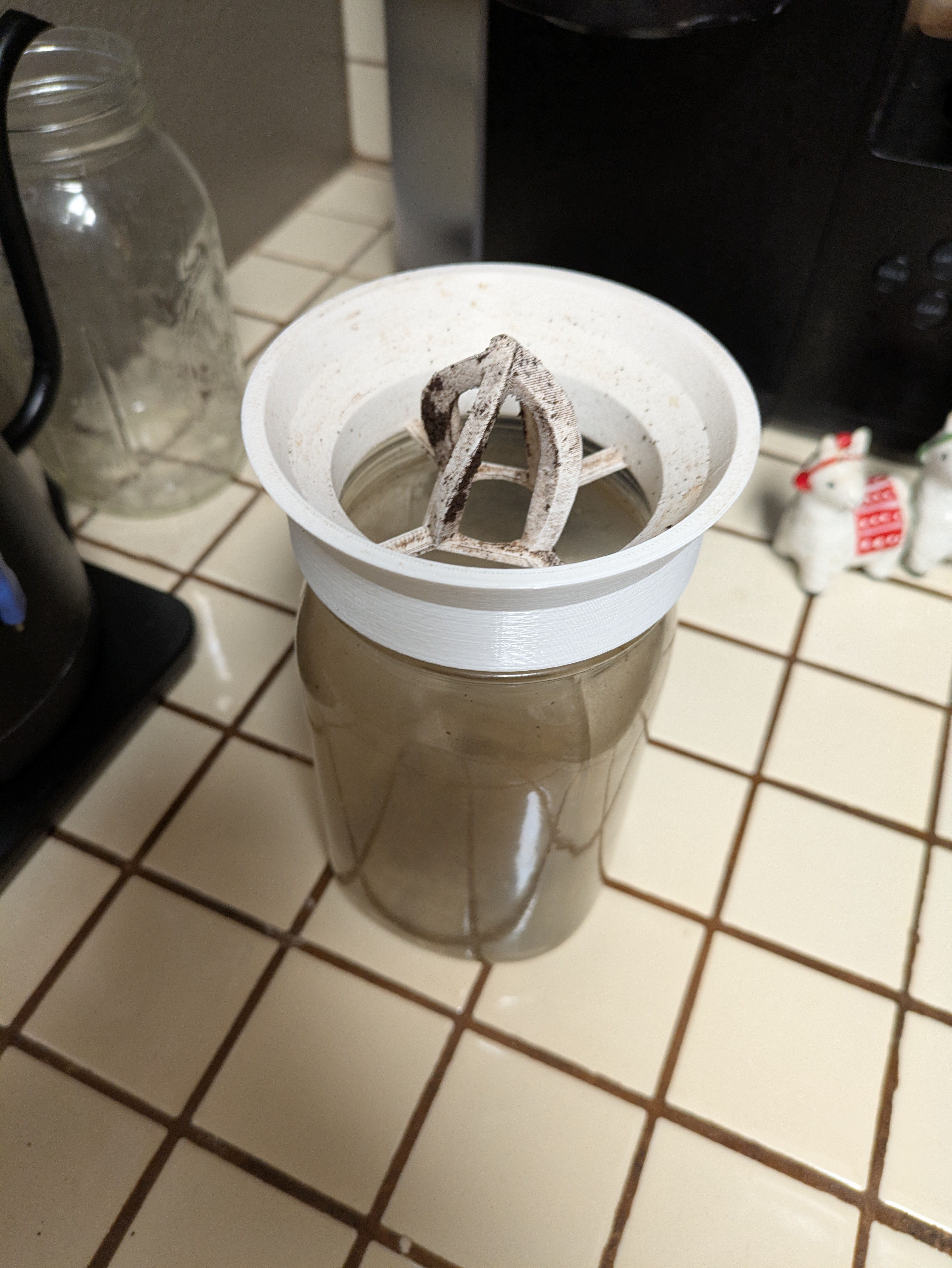 K-cup extractor with built in mason jar wide mouth lid