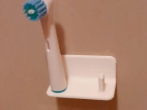 Holder for toothbrush heads