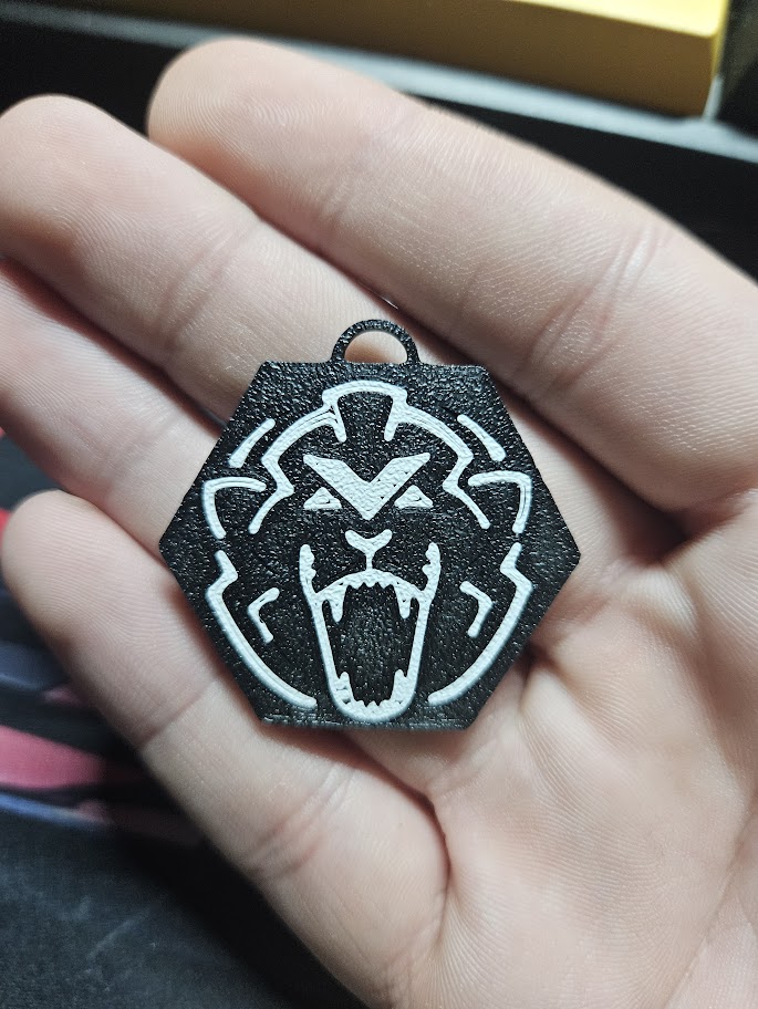 Max Verstappen lion logo keychain