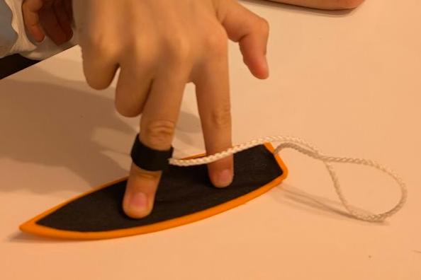 Surf board finger toy