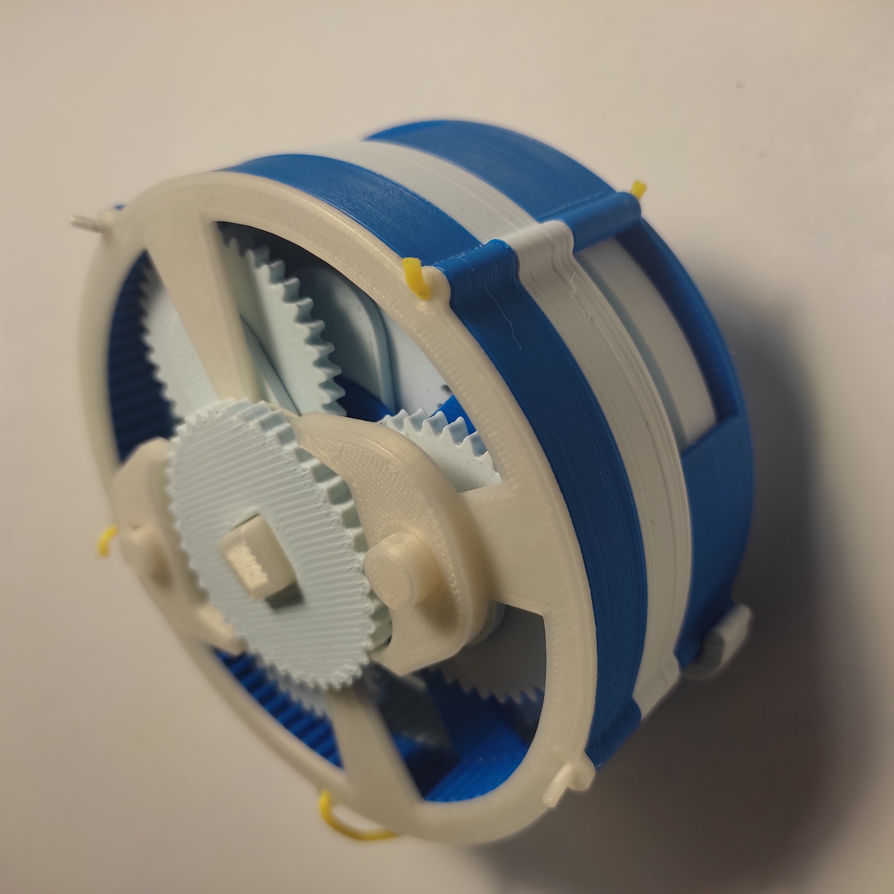 Windup mechanism with planetary gearbox and runaway escapement mechanism