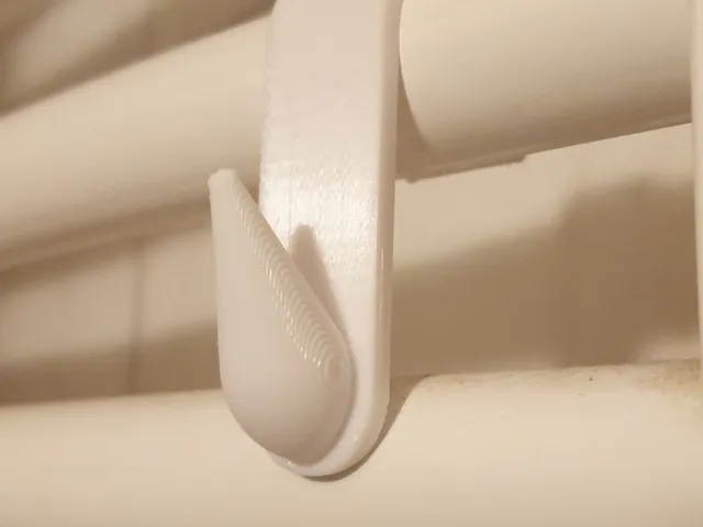 towel holder for radiator pipe