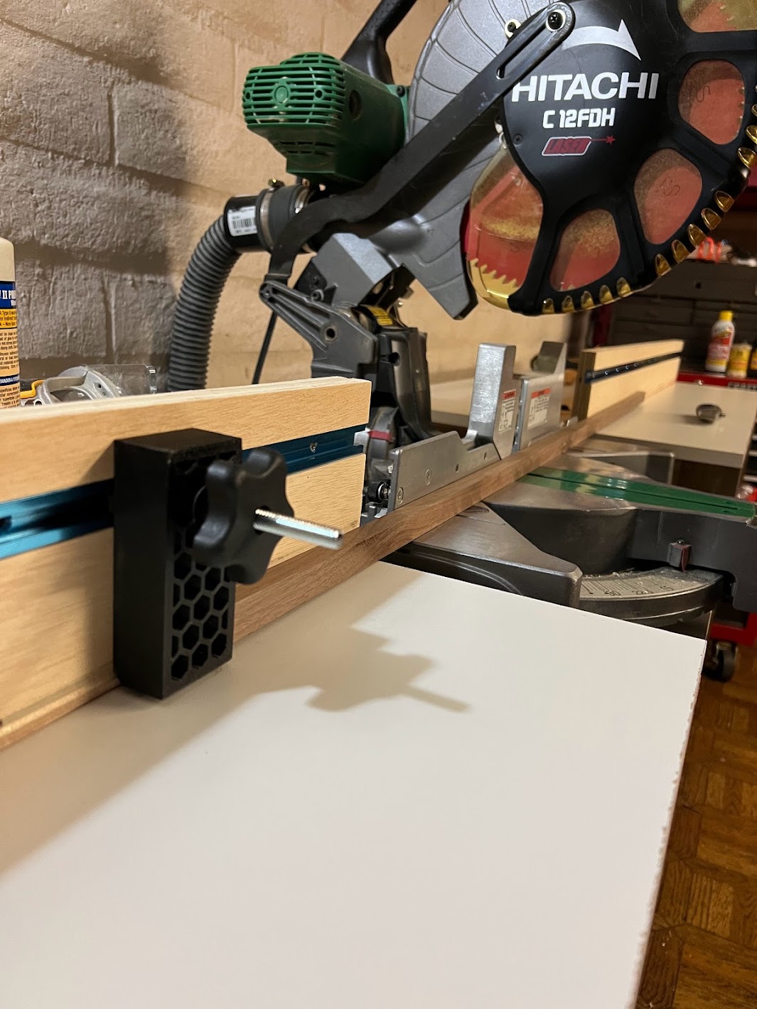 Stop block for miter saw station