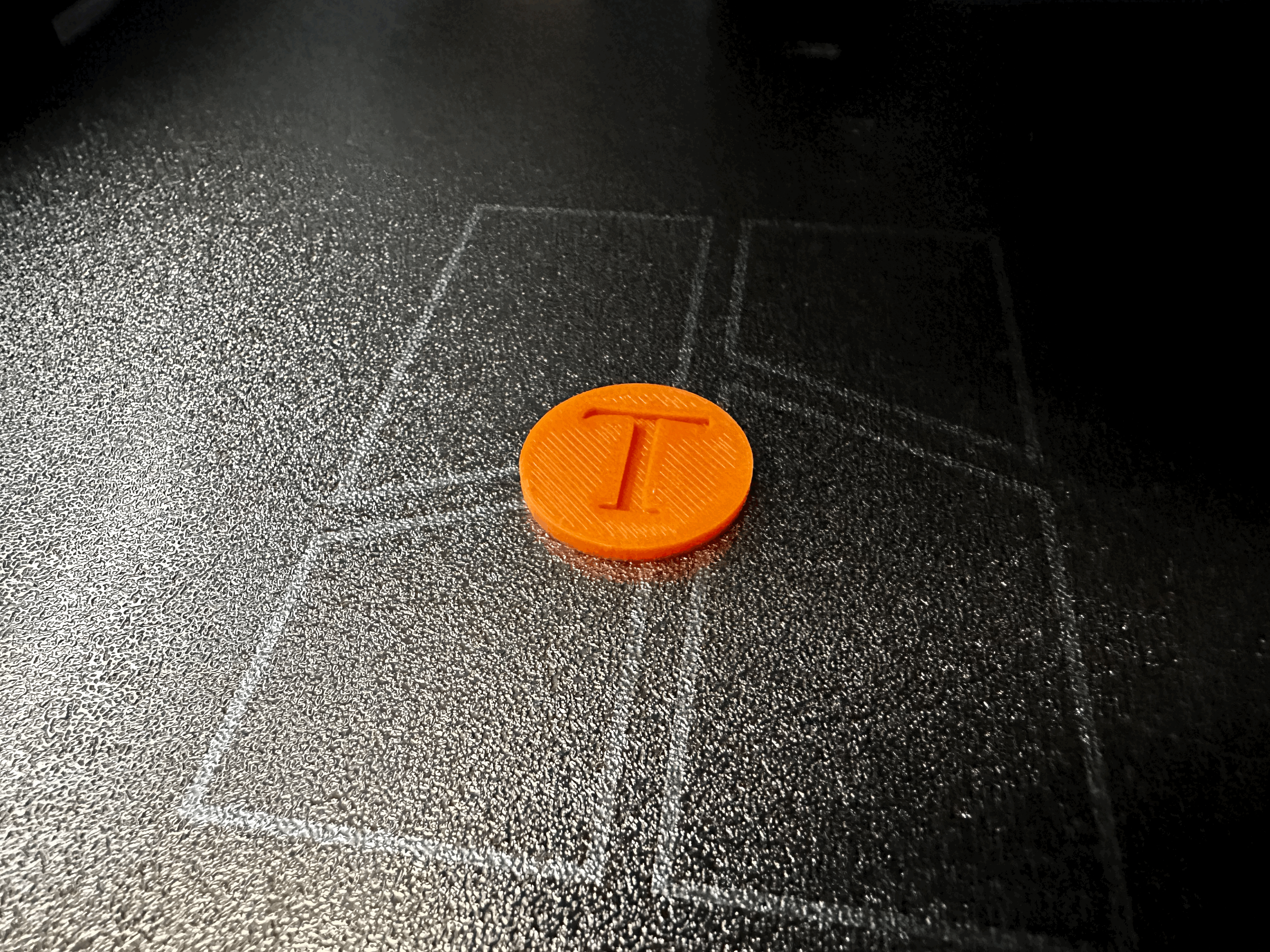 Einkaufswagenchip mit dem Buchstaben "T"