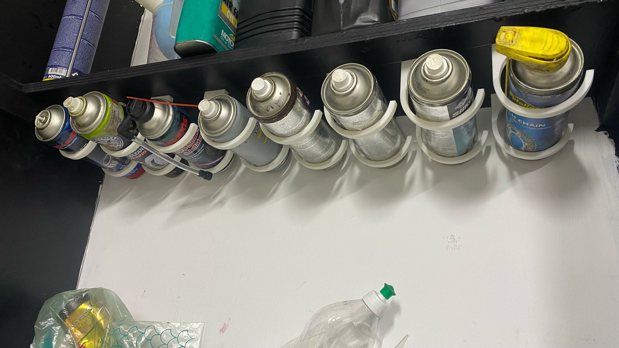 under shelf spray can holder