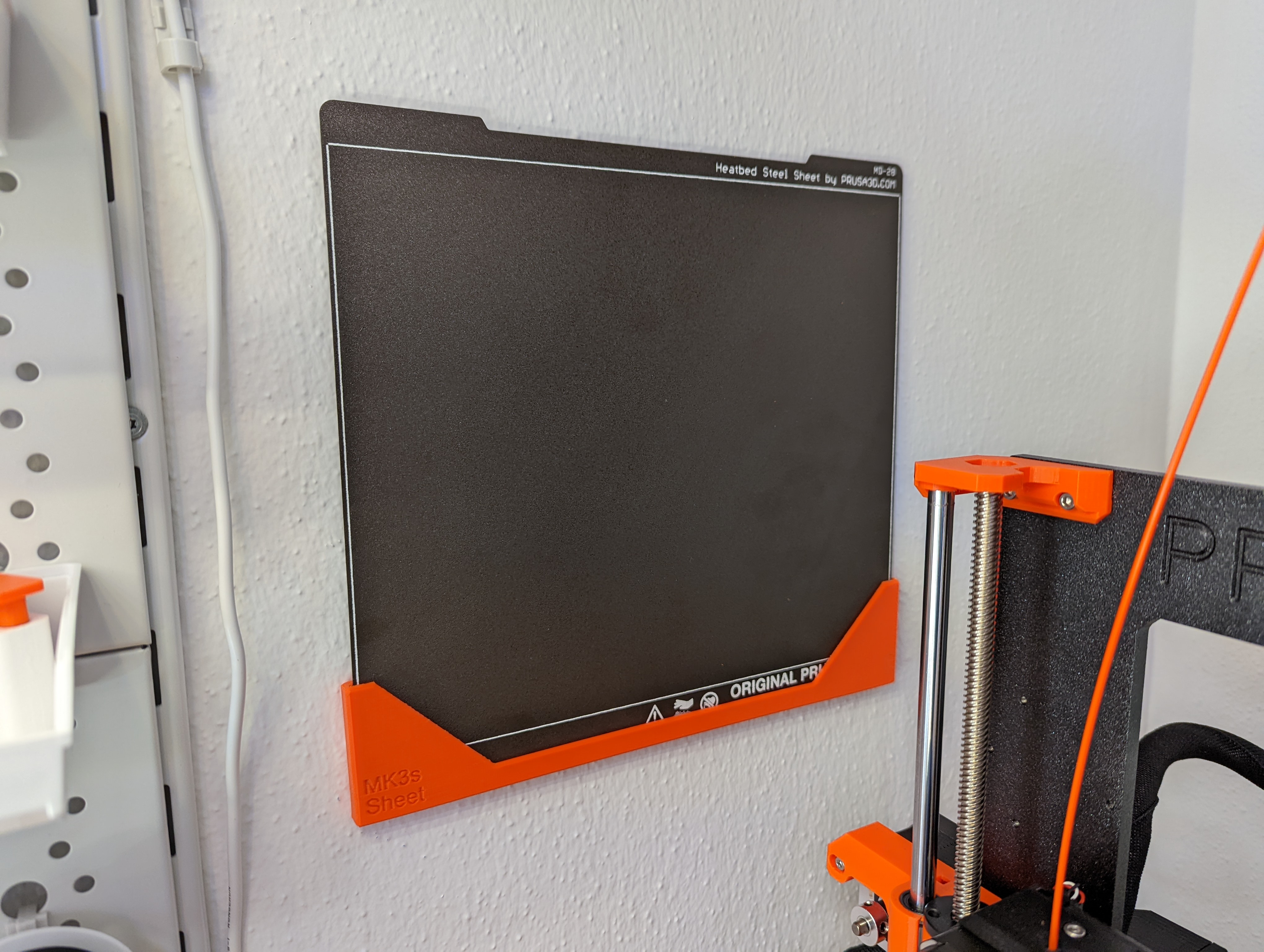 Spare steel sheet holder wall mount for adhesive strips