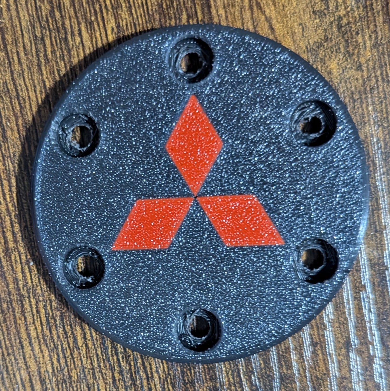 Logitech G29 center cap with Mitsubshi logo