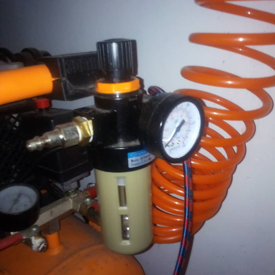 Support for the compressor's ambient humidity filter.