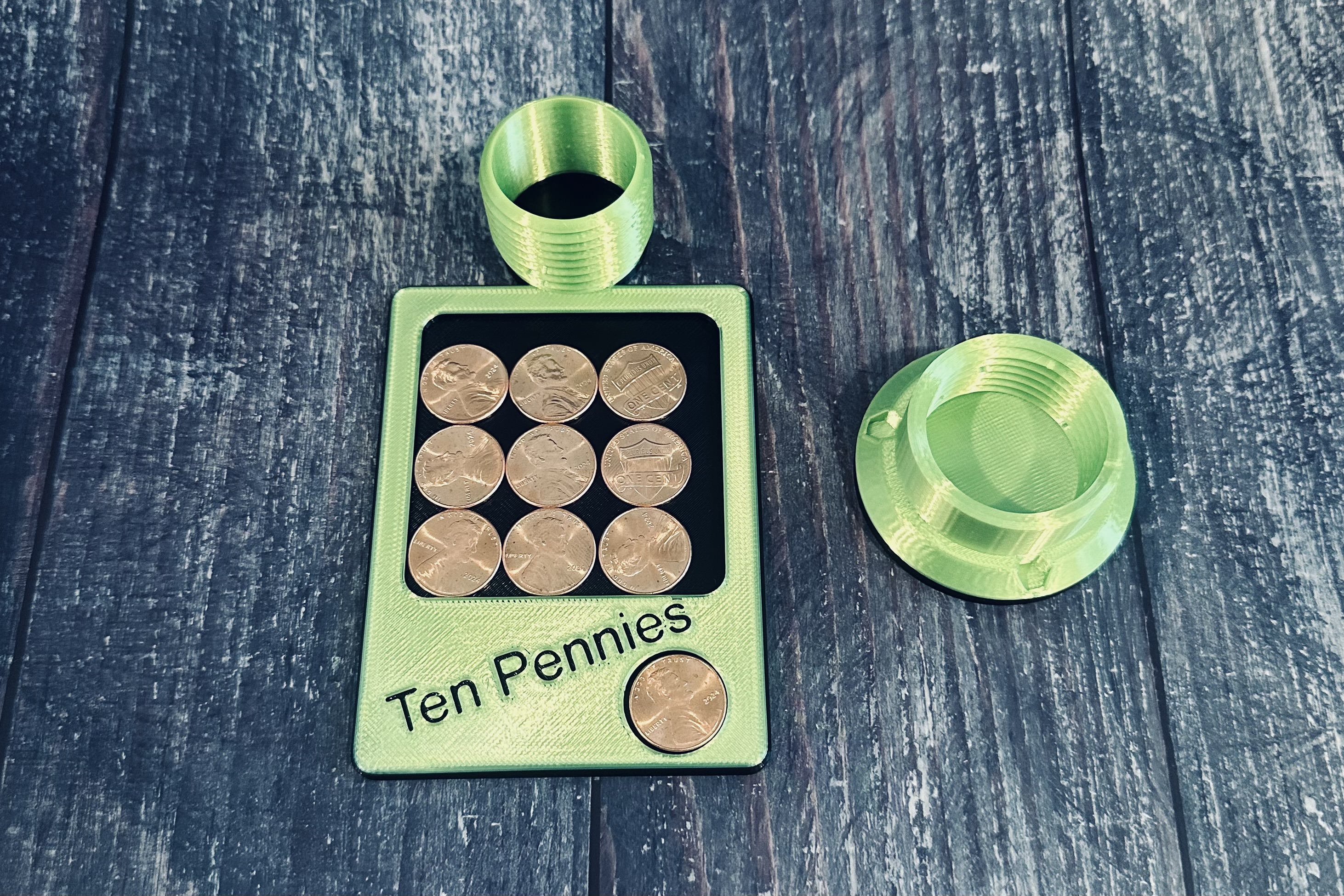 Ten Pennies Puzzle with Secure Storage Compartment for the Pennies