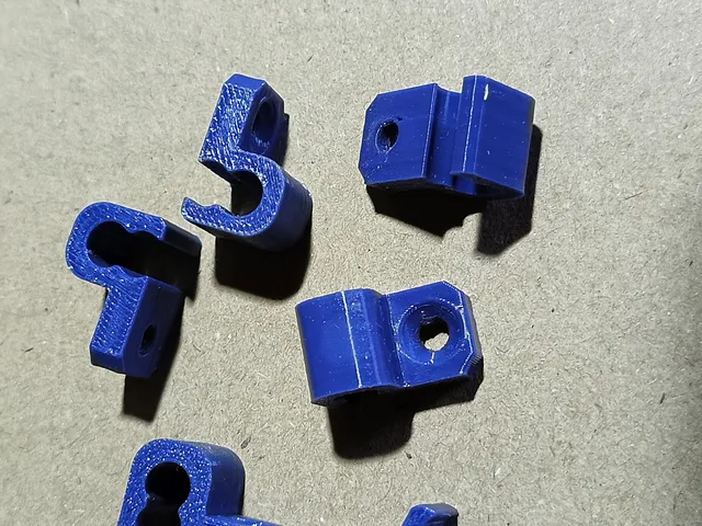 Holder for two RG-58 cables.