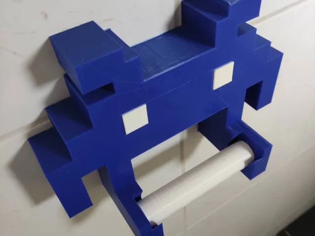 Toiletrol holder space invader