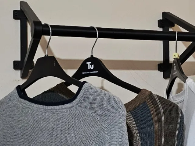 Wardrobe-less Wardrobe: The Coat-Hangin' Rail.