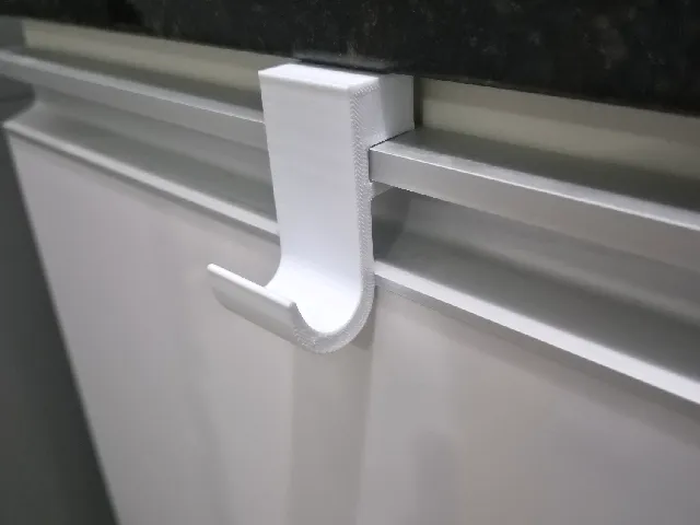 Dishcloth hook for cupboard