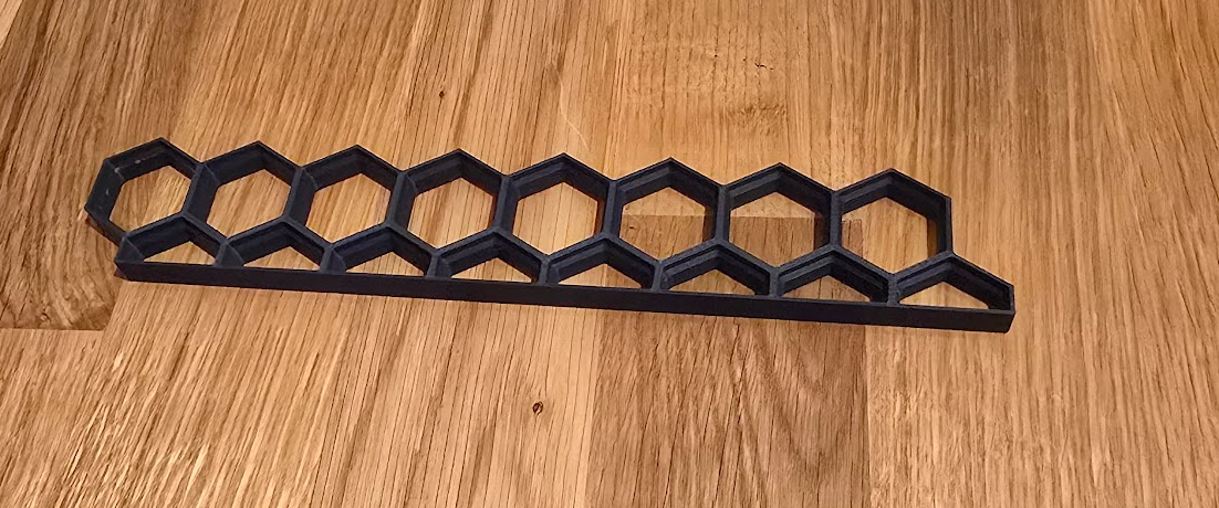 Side border for Honeycomb storage wall (remix 8 hexagons long)